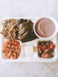 Directly above shot of food served in disposable plate