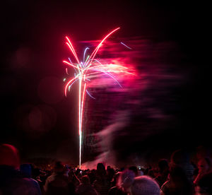 Crowds watching the annual bicester round table fireworks disaplay at pingle field, bicester