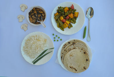 High angle view of breakfast served on table