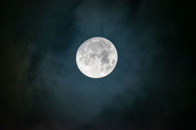 Low angle view of full moon in sky