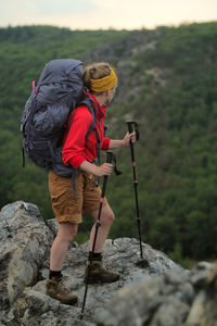 Full length of senior man on rock