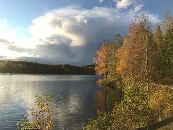 Scenic view of lake against sky during autumn