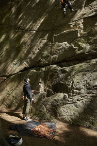 View of rock climbers on rock face