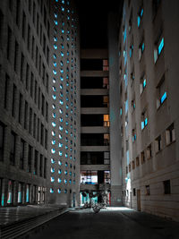 Low angle view of illuminated buildings at night