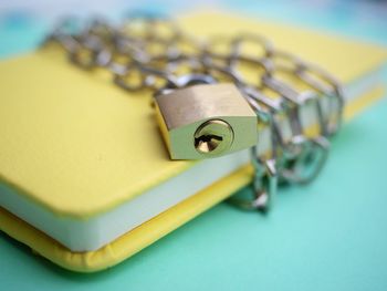 Close-up of padlock on table