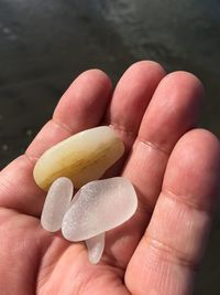 Close-up of hand holding ice cream