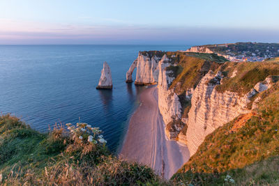 Panoramic view of sea against evening sky to alabaster coast, Étretat, normandie, france.