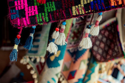 Close-up of clothes hanging in market