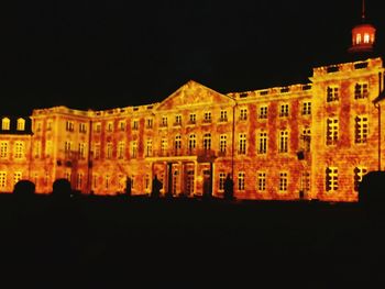 View of illuminated buildings at night