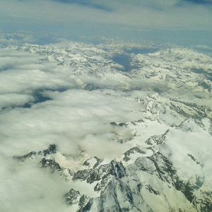 Aerial view of snow covered mountains