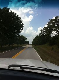 Road seen through car windshield