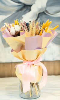 Close-up of rose flower on table