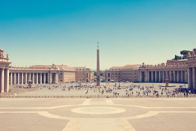 Tourist at st peter square against clear sky