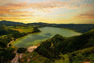 Scenic view of landscape against sky during sunset