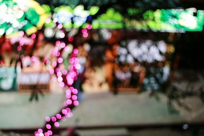 Defocused image of illuminated water at night