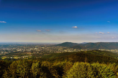 Scenic view of landscape against blue sky in bielsko biala, south poland