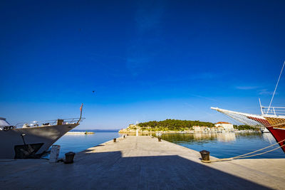 Scenic view of sea against blue sky