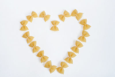 High angle view of cookies on white background