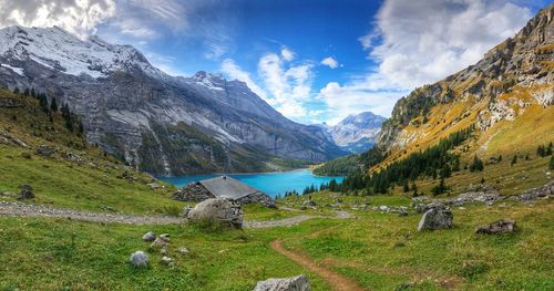 Scenic view of landscape and mountains against sky