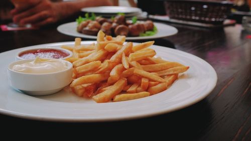 Close-up of food served on table