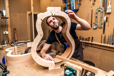 Man working on wood