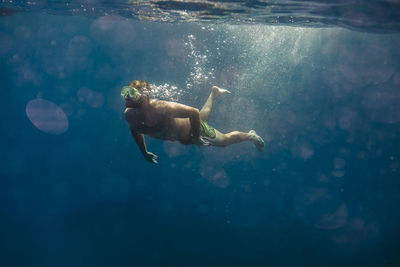 Man swimming underwater