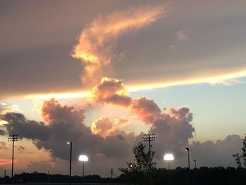 Silhouette of landscape against dramatic sky