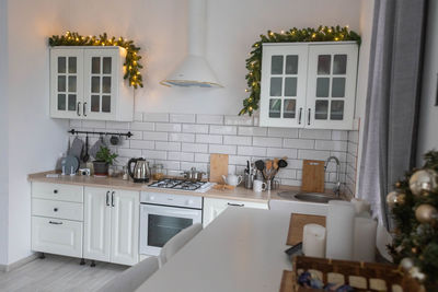 Bright kitchen in the scandinavian style with christmas decorations