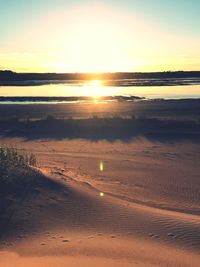 Sun shining over sea