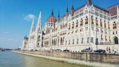 Panoramic view of buildings against sky in city