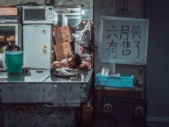 Full length of man in store