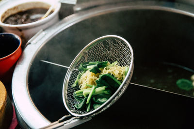 High angle view of rice in container