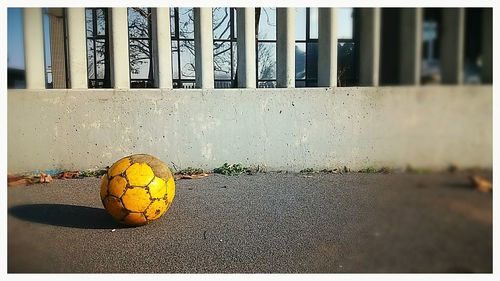 Close-up of soccer ball on field