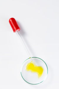 High angle view of drink against white background