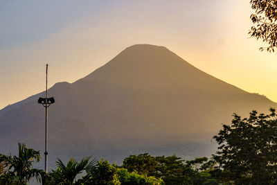 Scenic view of mountains against sky during sunset