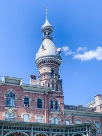 Low angle view of building against blue sky