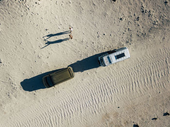 High angle view of text on sand at beach