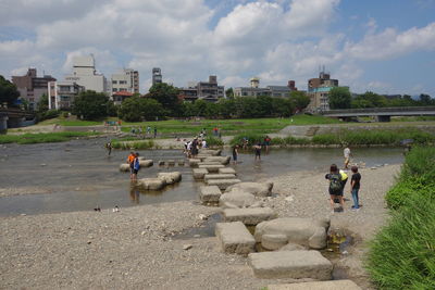 People at park against sky
