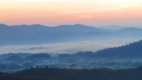 Scenic view of mountains at sunset