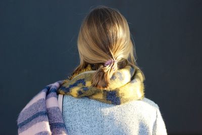 Rear view of woman wearing scarf