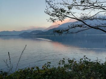 Scenic view of lake against sky during sunset