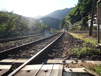 Railroad track against sky