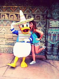 Full length portrait of young woman