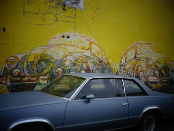 Car parked against wall