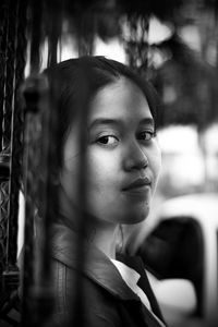 Portrait of a young woman looking away