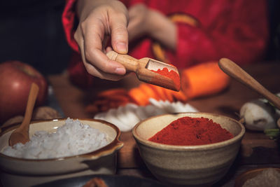 Midsection of woman holding food