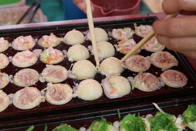 Close-up of hand holding food
