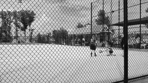 Chainlink fence against sky