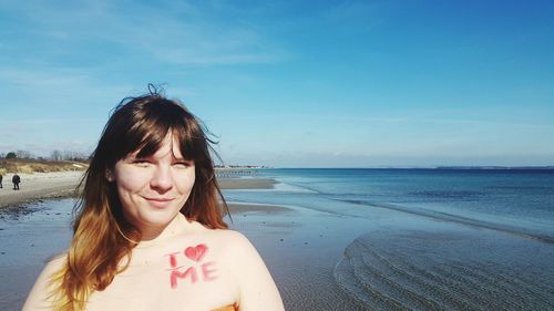 Woman standing on beach