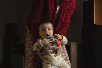 Portrait of cute baby at home